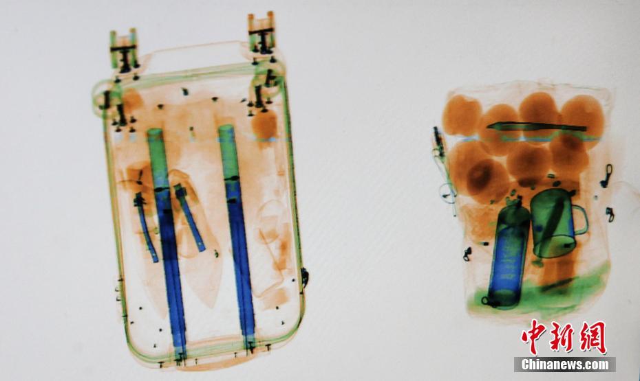 安检X光机下的春运归家图 宛如一幅幅水彩画